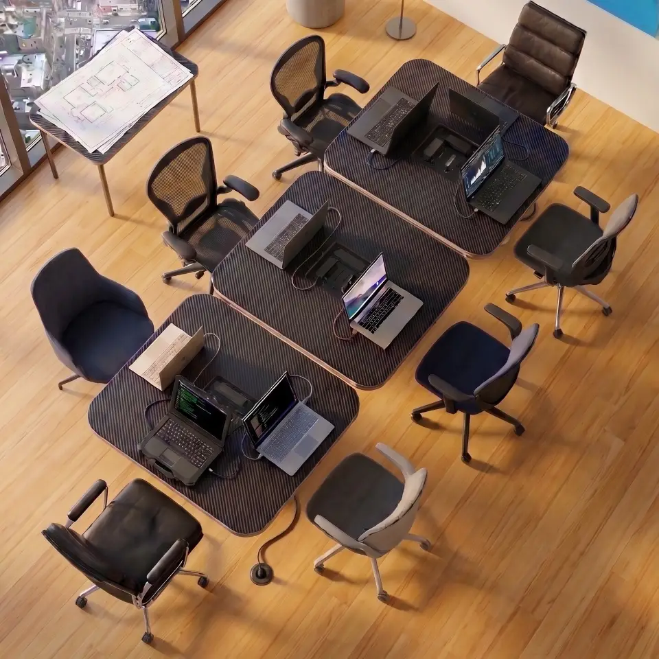 Modern parametric CoWork conference table in carbon fiber finish with exposed plywood edges, designed for collaborative office spaces.
